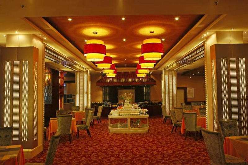 فندق Jiangtian المطعم الصورة